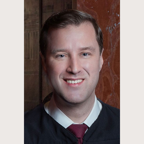 Picture of Honorable Evan Young, Justice
